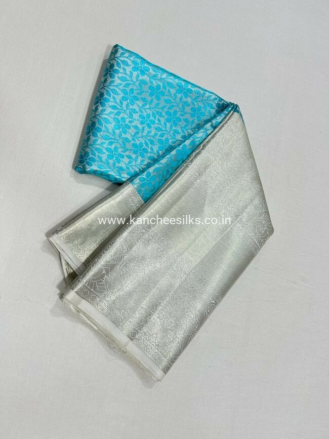 pure kanchipattu blue tissue brocade saree  with silver tissue  blouse