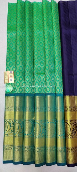 pure kanchipattu free size green lehenga with navy blue blouse